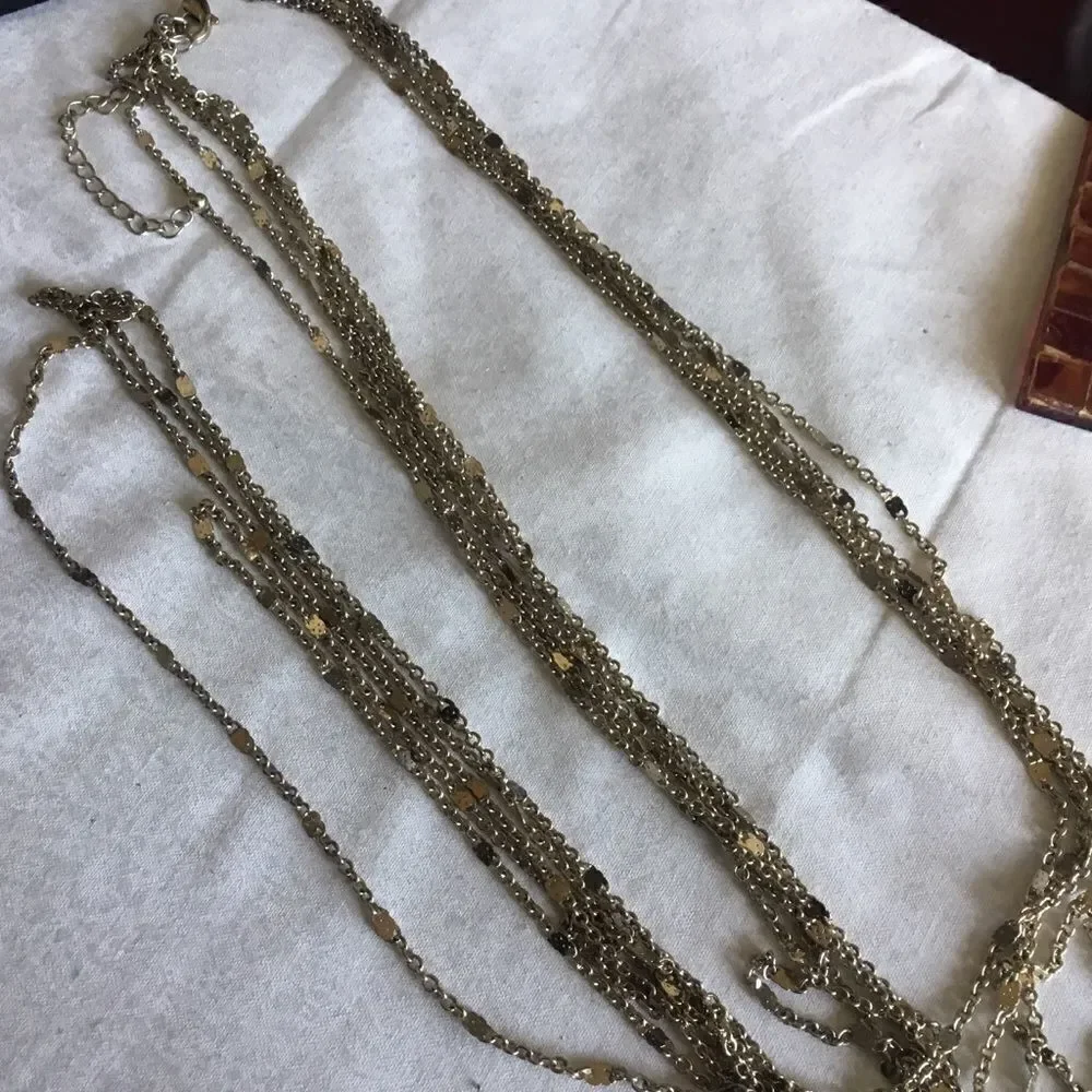 $12 or 3/$25. 5 Strand Goldtone Necklace